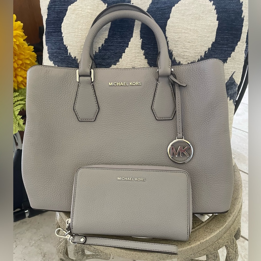 Authentic Michael Michael Kors Large handbag and matching wallet.